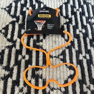 Spalding back atcha basketball return